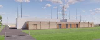 Een foto van een kerncentrale op een digitaal groener gemaakt grasveld. Ondanks het feit dat dit gebouw ruimte heeft voor zonnepanelen hebben we deze om de psychologie van de lezer te beïnvloeden achterwege gelaten.